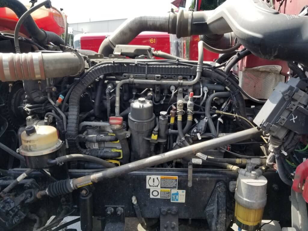 Right side of Paccar MX13 engine showing the engine oil fill cap