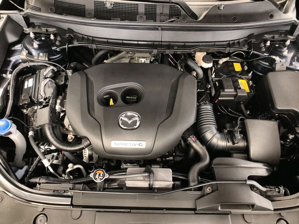 Mazda CX-9 Engine bay with oil fill cap and dip stick pictured