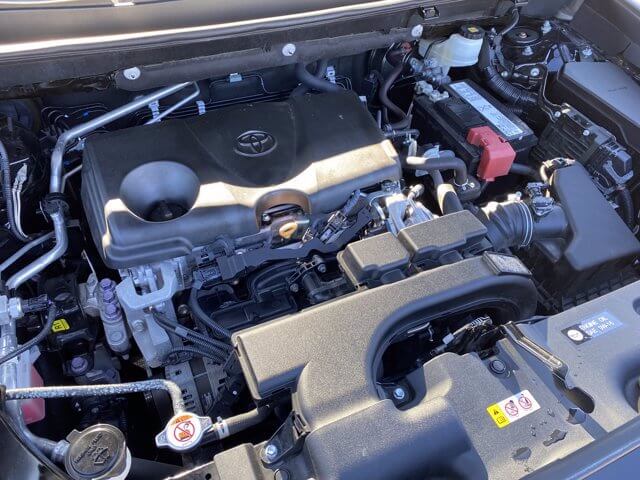 Toyota RAV4 engine bay with engine oil fill cap and dip stick pictured