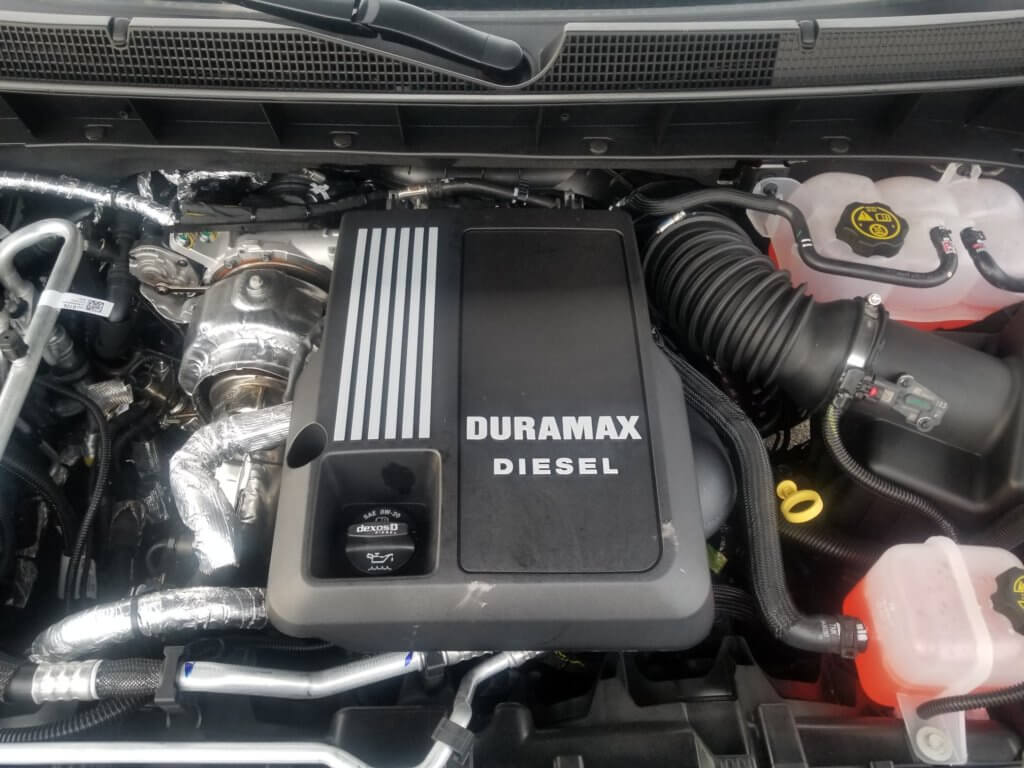 3.0L Duramax engine bay with engine oil fill cap and dip stick pictured