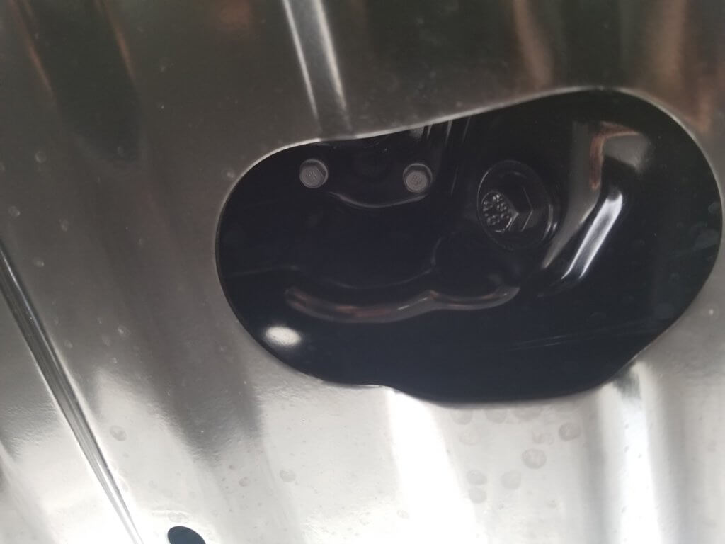 Grand Cherokee drain plug pictured above skid plate