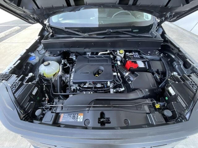 Ford Bronco Sport 1.5L engine bay with engine oil fill cap and dip stick pictured