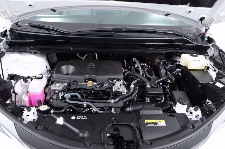 Toyota Sienna Hybrid engine bay with engine oil fill cap and dip stick pictured