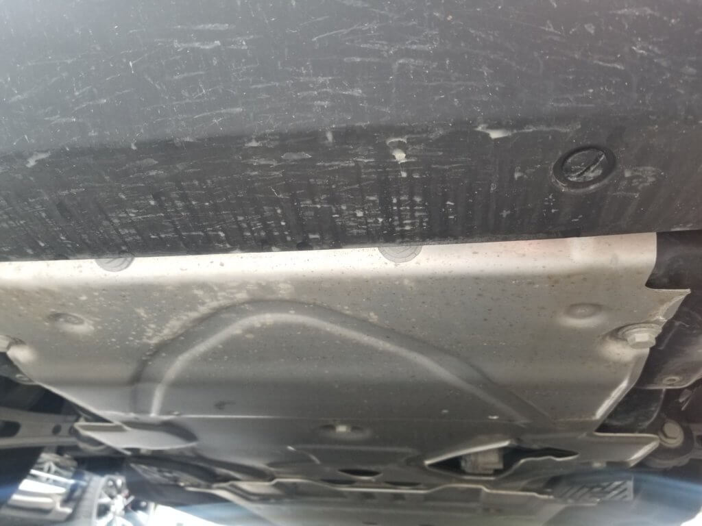 Skid plates need to be removed when performing an oil change on the Land Rover Defender