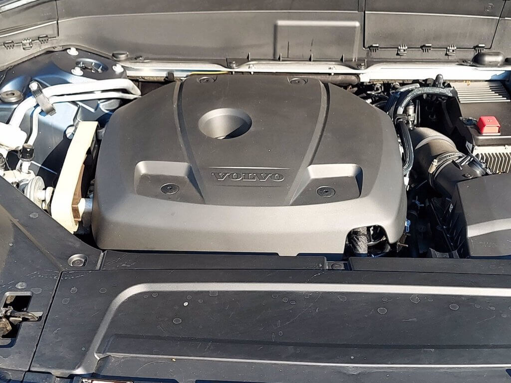 Volvo XC90 engine bay with engine oil fill cap and dip stick pictured